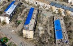 В городе Қонаев обновляют кровли 13 жилых домов